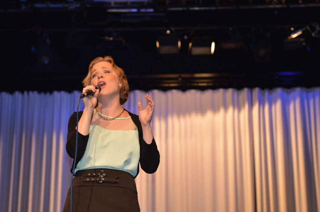 Singer performing on stage