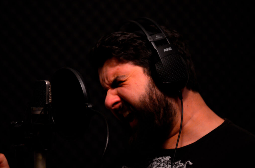 Artist singing recording song 