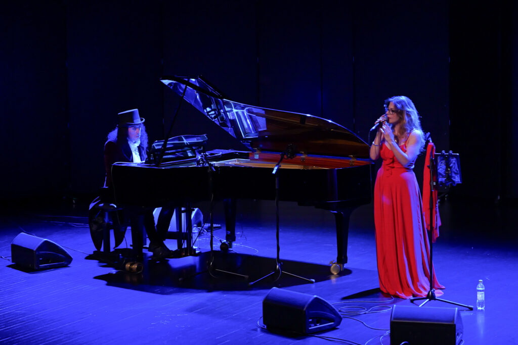 She is performing on the stage