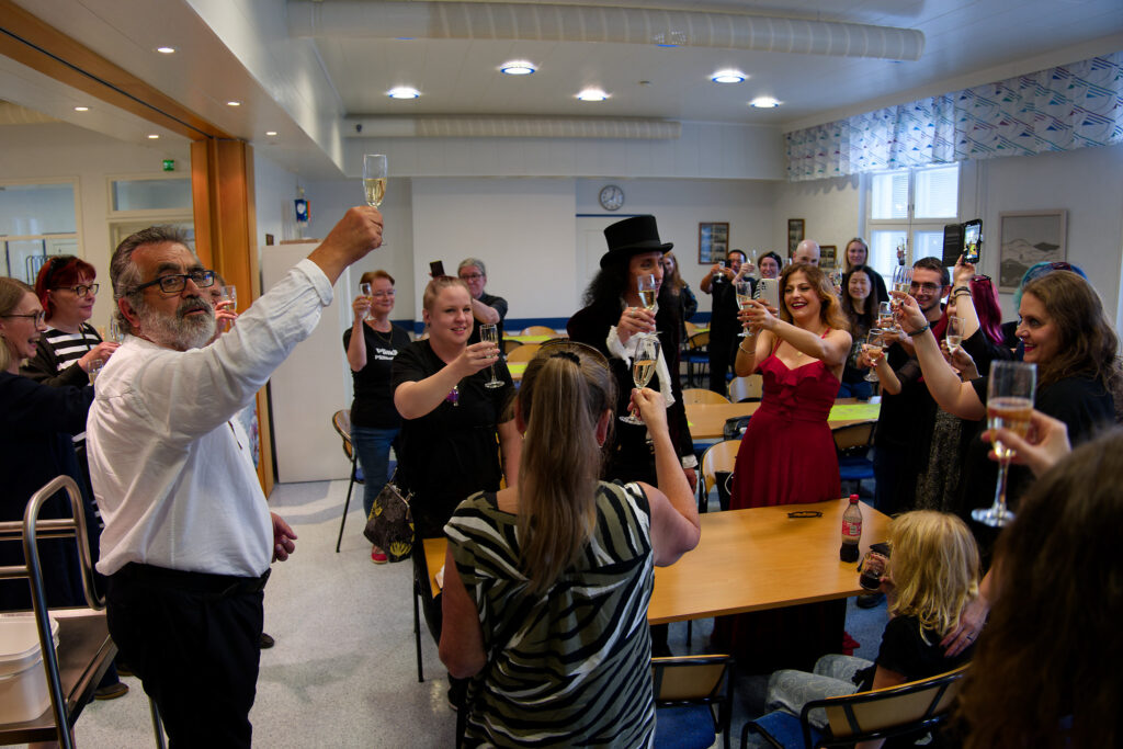 Plamen cheering with people