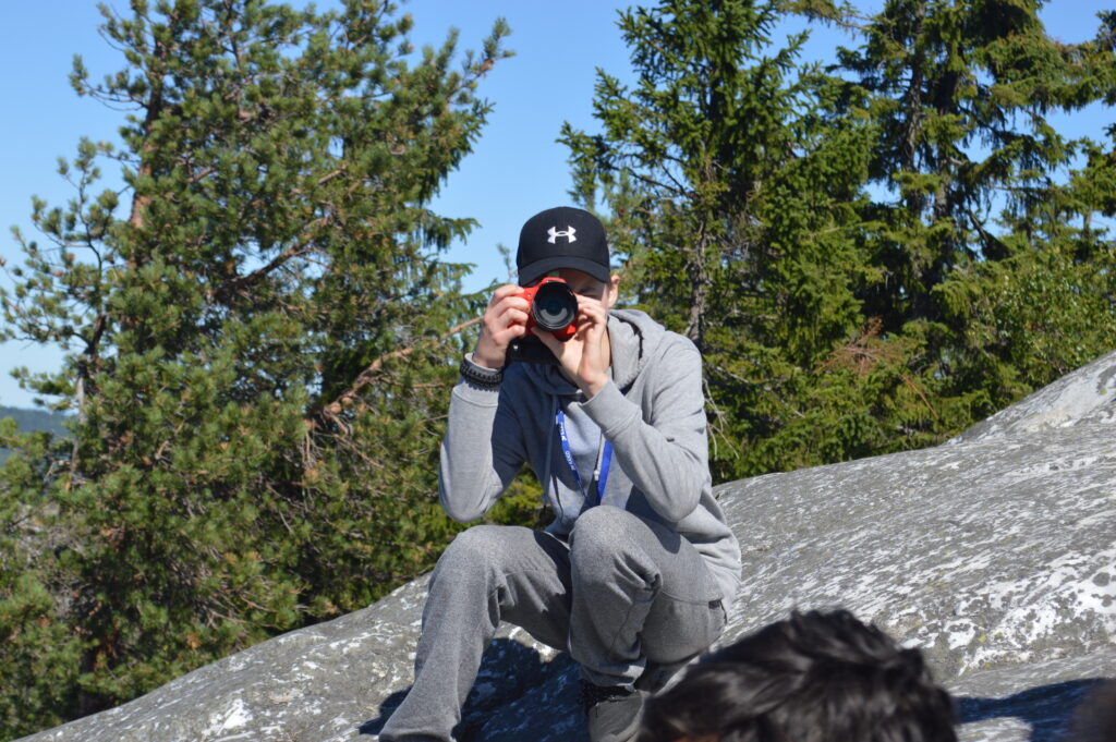 A boy taking picture 