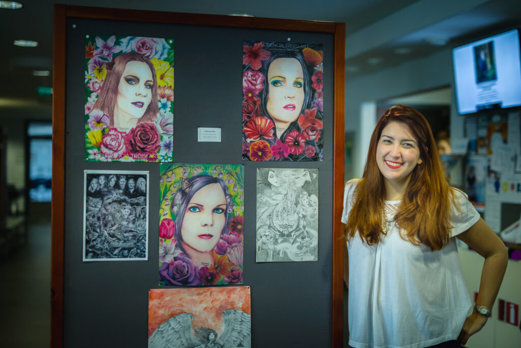 She is posing picture with different sketch